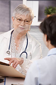 Doctor explaining to patient