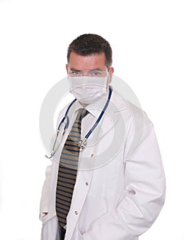 Doctor with face mask looks intently at camera