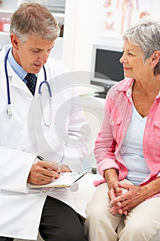 Doctor with female patient