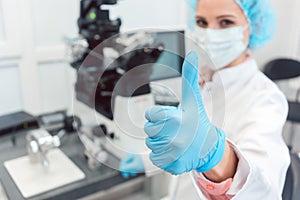 Doctor in fertility lab having just fertilized a human egg photo