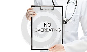 Doctor forbidding overeating photo