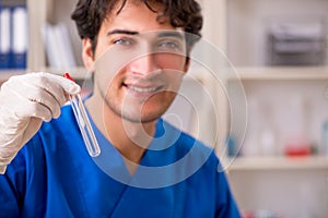 The doctor getting saliva test sample in clinic hospital photo