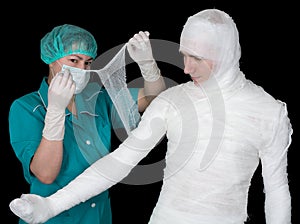 Doctor give bandaged patient