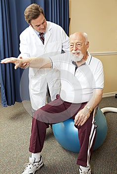 Doctor Gives Physical Therapy photo