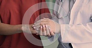 Doctor gives psychological support to patient, close up