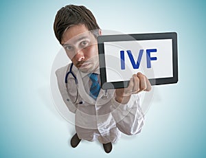 Doctor is giving advice for In-vitro fertilisation IVF. photo