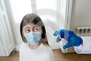 Doctor giving COVID-19 Vaccine to a patient at the clinic hospital. First safe and effective coronavirus Vaccine, human clinical t