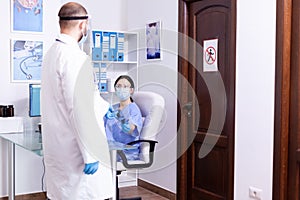 Doctor giving nurse patient radiography