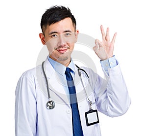 Doctor giving okay gesture