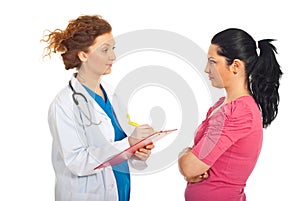 Doctor giving prescription to patient woman