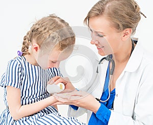 Doctor giving vitamins.