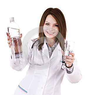 Doctor with glass of water and bottle.