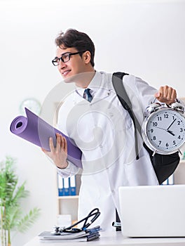 Doctor going to gym during lunch break