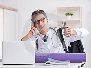 Doctor going to gym during lunch break