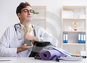 Doctor going to gym during lunch break