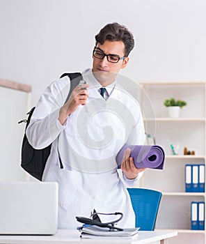 Doctor going to gym during lunch break