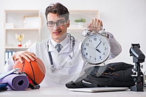 The doctor going to sports during lunch break