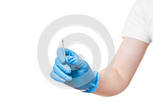 Doctor hand in a blue sterile glove holds to give cotton swab for sampling smear analysis.