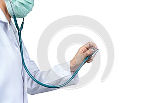 Doctor hand holding stethoscope for listening heartbeat of patient. Doctor in white gown uniform and green mask. Healthcare