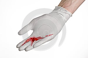 Doctor hand holding a vial, ampule red, vaccine ampule, Ebola vaccine, flu treatment, white background