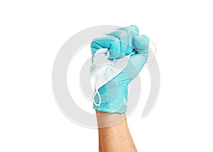 Doctor hand in medical glove with a mask.