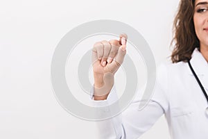 Doctor hand showing pill on white background