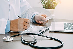 doctor hands checking report paper's patient diagnosing of doctor.