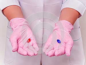 Doctor Hands with Pills. Difficult Choice between drugs. Placebo drugs concept. Healthcare concept photo