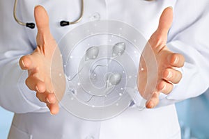 Doctor hands showing spermatozoa