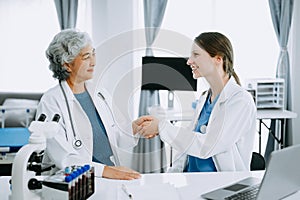 Doctor handshake and partnership in healthcare, medicine or trust for collaboration, unity or support.Team of medical experts