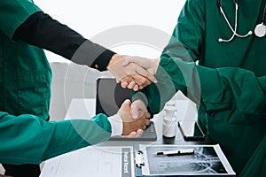 Doctor handshake and partnership in healthcare, medicine or trust for collaboration, unity or support.Team of medical experts