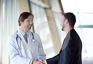 Doctor handshake with a patient