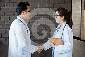 Doctor handshake and successful teamwork
