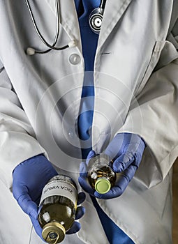 Doctor has in his hands ZICA virus vaccines in a hospital