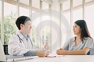 Doctor have consultation with female patient