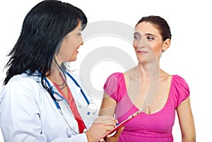 Doctor having conversation with her patient