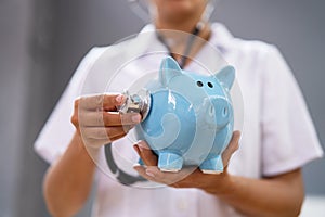 Doctor Health Checking Piggy Bank