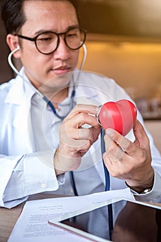 Doctor with Heart Disease Checker