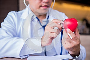 Doctor with Heart Disease Checker