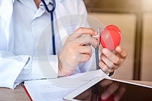 Doctor with Heart Disease Checker