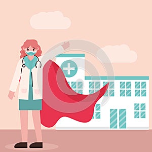 Doctor hero, female physician with mask and cape hospital care