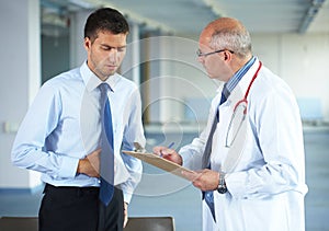 Doctor and his patient, indoor shoot photo