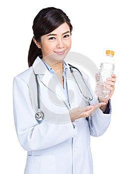 Doctor hold water bottle