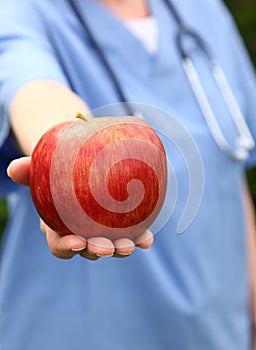 Doctor Holding Apple