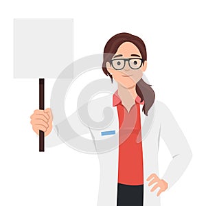 Doctor holding blank board in her hand. Woman doctor personage presenting sign