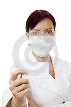 Doctor holding blank card