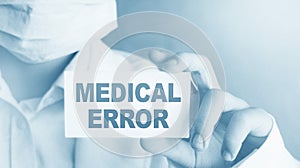 Doctor holding a card with Medical Error, Medical concept