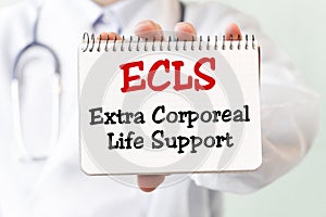 Doctor holding a card with text ECLS - Extra Corporeal Life Support - medical concept photo