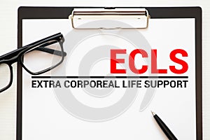 Doctor holding a card with text ECLS Extra Corporeal Life Support medical concept