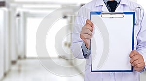 doctor holding a clipboard Hands of Health care medical backgro